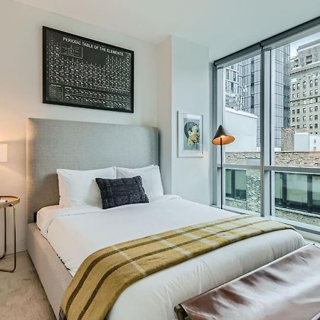 Sentral Michigan Avenue Aparthotel Chicago Ruang foto A bedroom